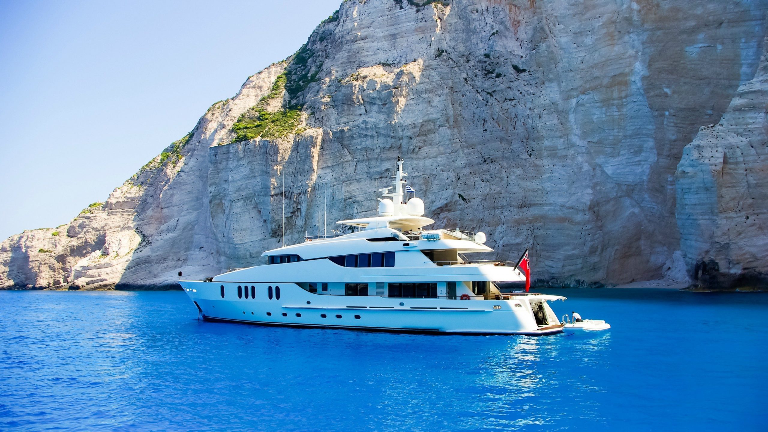 Luxury superyacht cruising along the Mediterranean coast